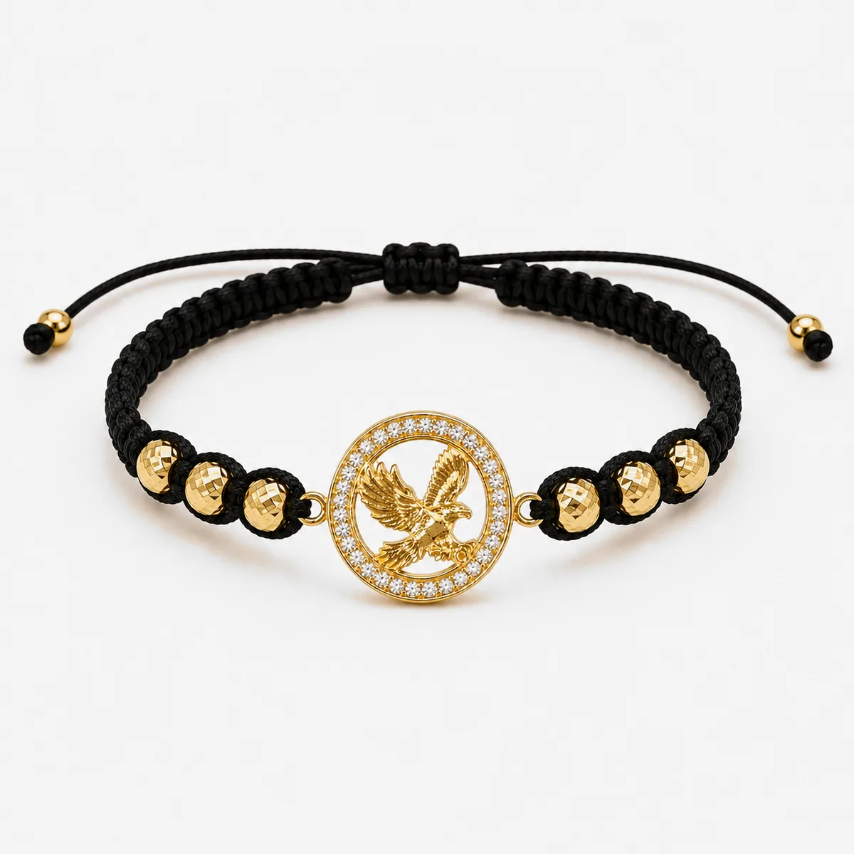 Pulsera de hilo negro con motivo de águila
